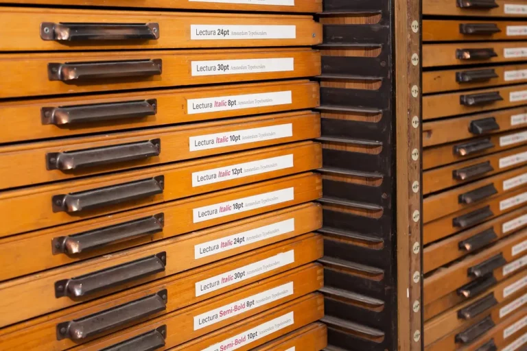 Typesetting cabinets with labeled font drawers.